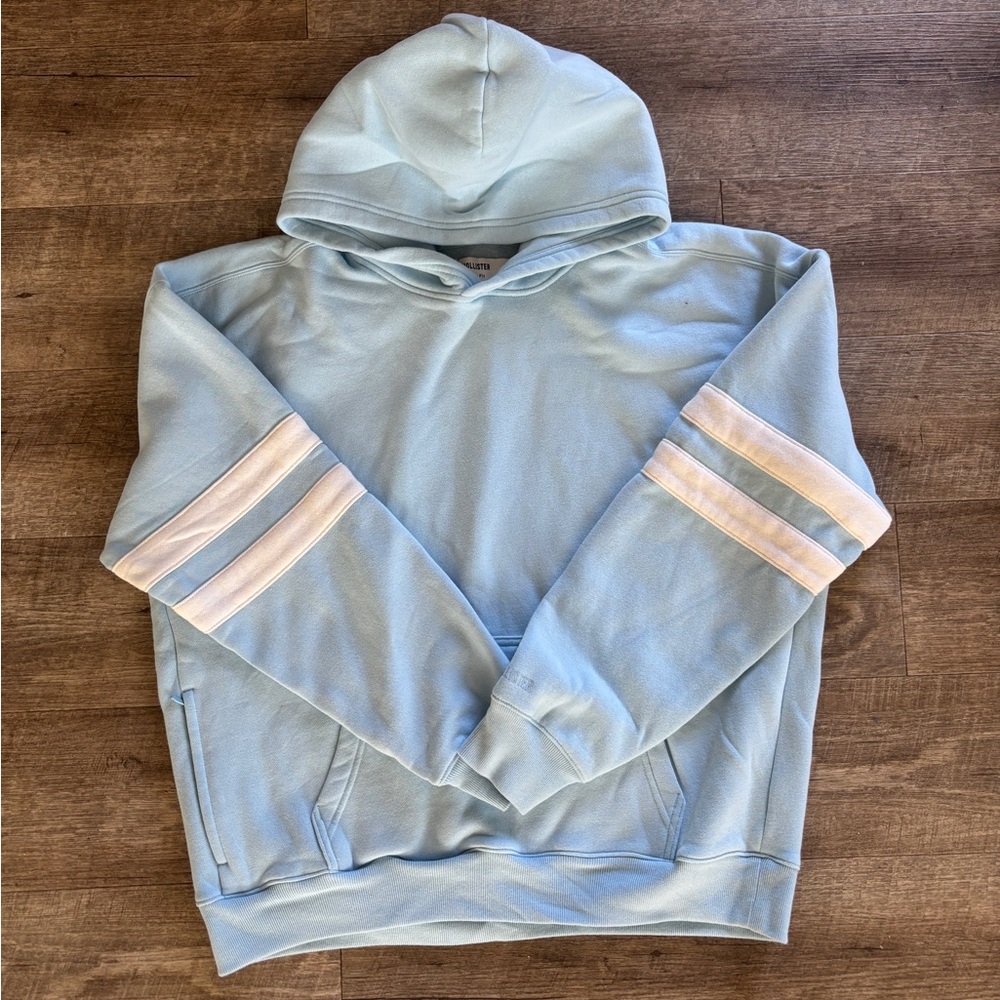 Hollister Sky Blue Hoodie with White Arm Stripes
